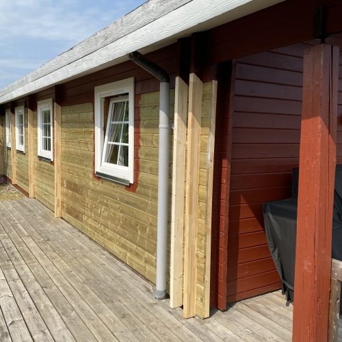 Renovering af hus der bliver malet i rødt
