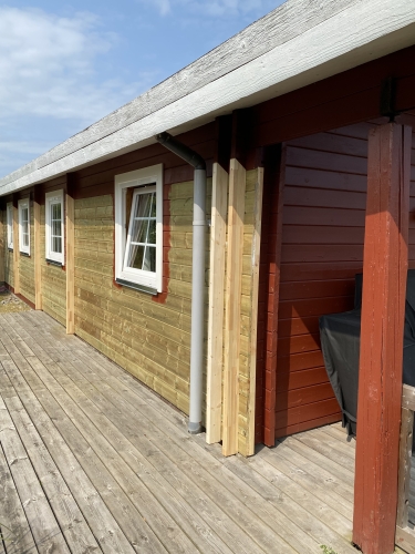 Renovering af hus der bliver malet i rødt